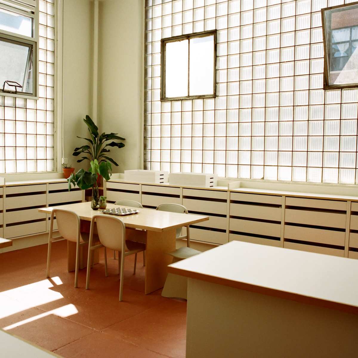 Material Library Studio Flooded in Natural Light with Glass Brick