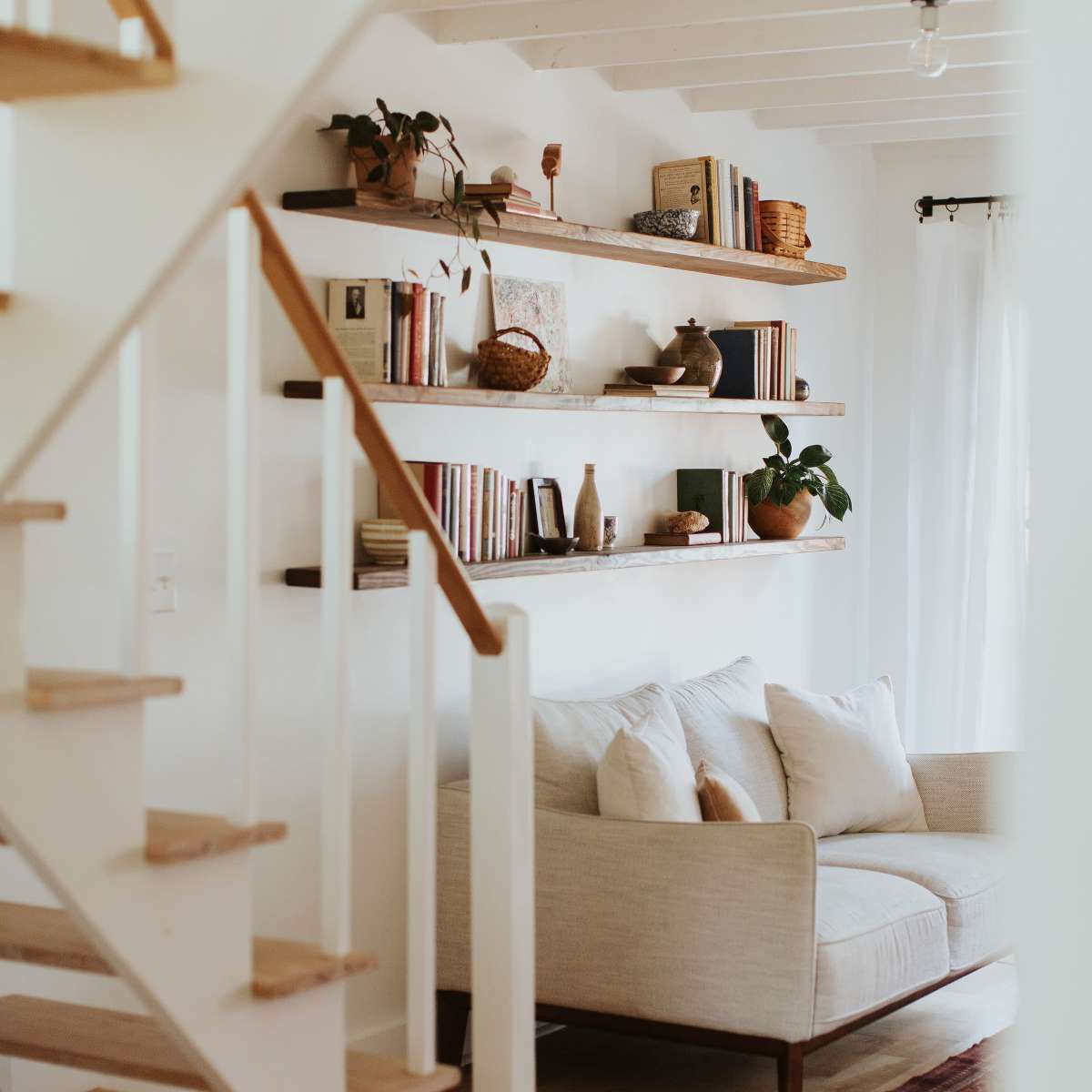 Thoughtfully Curated Guest Suite | tasteful decor, library wall & natural light in Nashville Image in East Nashville, Nashville, TN
