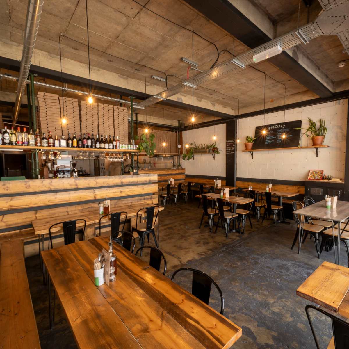 Rustic pizza restaurant with high exposed beam ceilings. in London Image in London, London, ENG