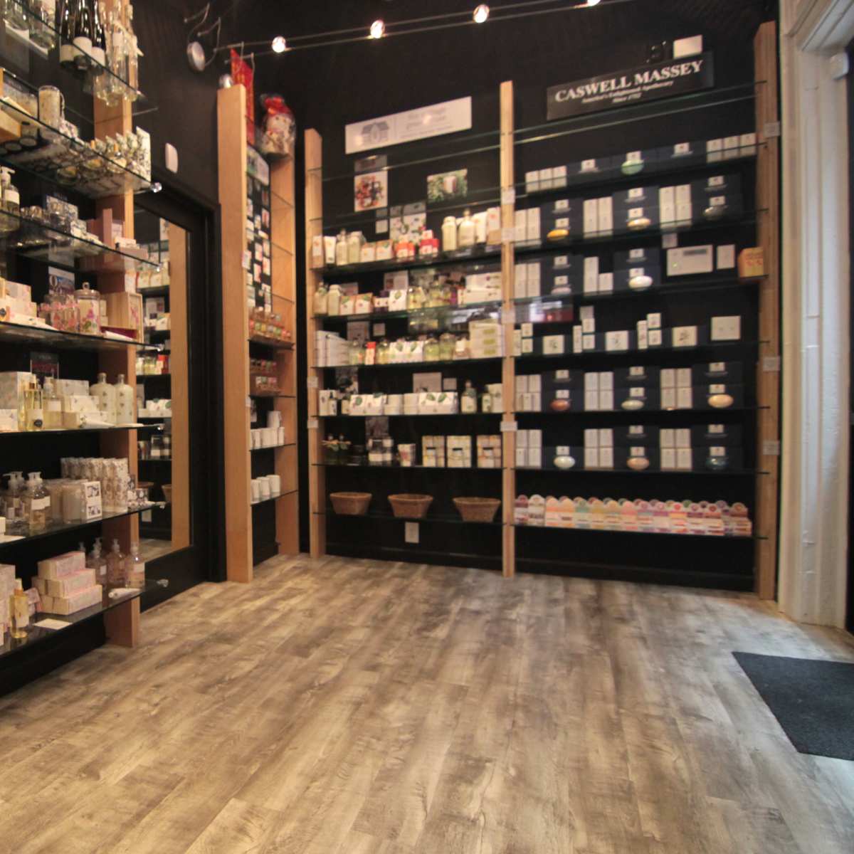 A well-organized retail space filled with shelves of various beauty and personal care products.