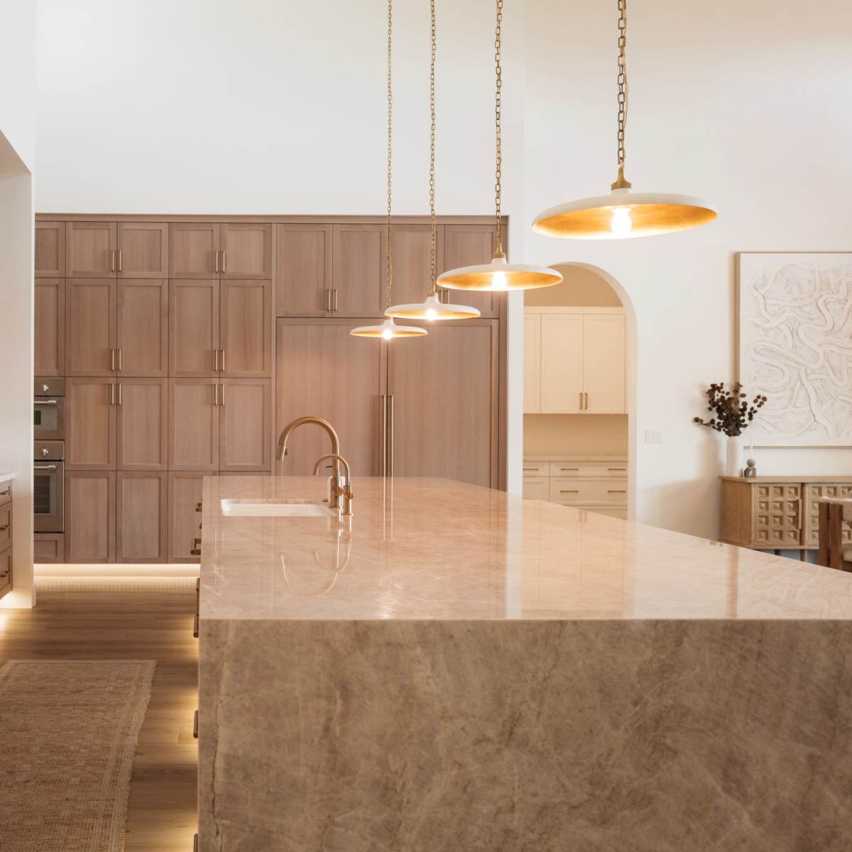 Spanish Modern Home w/ Warm Finishes, Mountain Views & Natural Light in Buckeye Image in Verrado, Buckeye, AZ