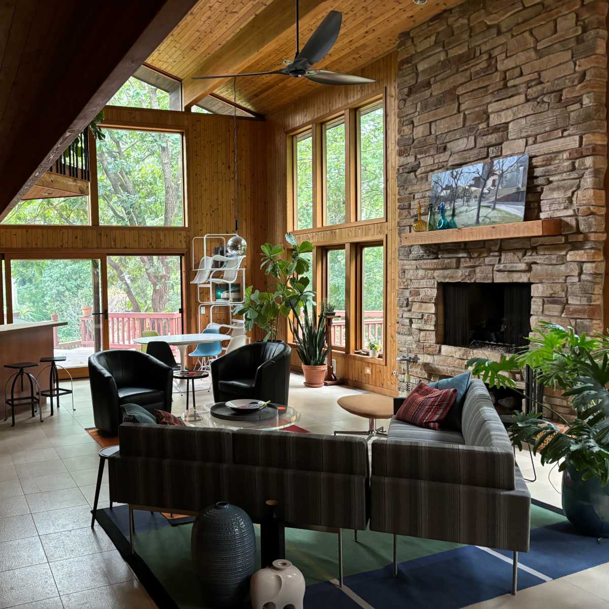 Suburban home in garden setting with lofty, bright and woodsy interior ...