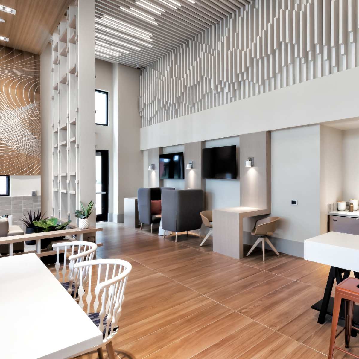 Stunning Lounge with Double-Height Ceilings & Abundant Seating ...