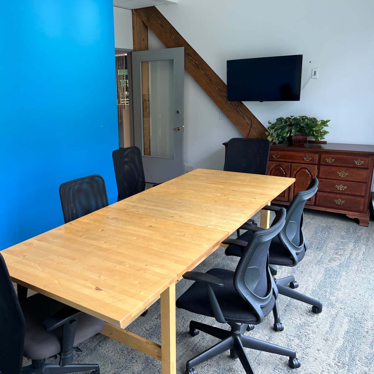 Downtown Conference Room with high ceilings and large windows with view ...