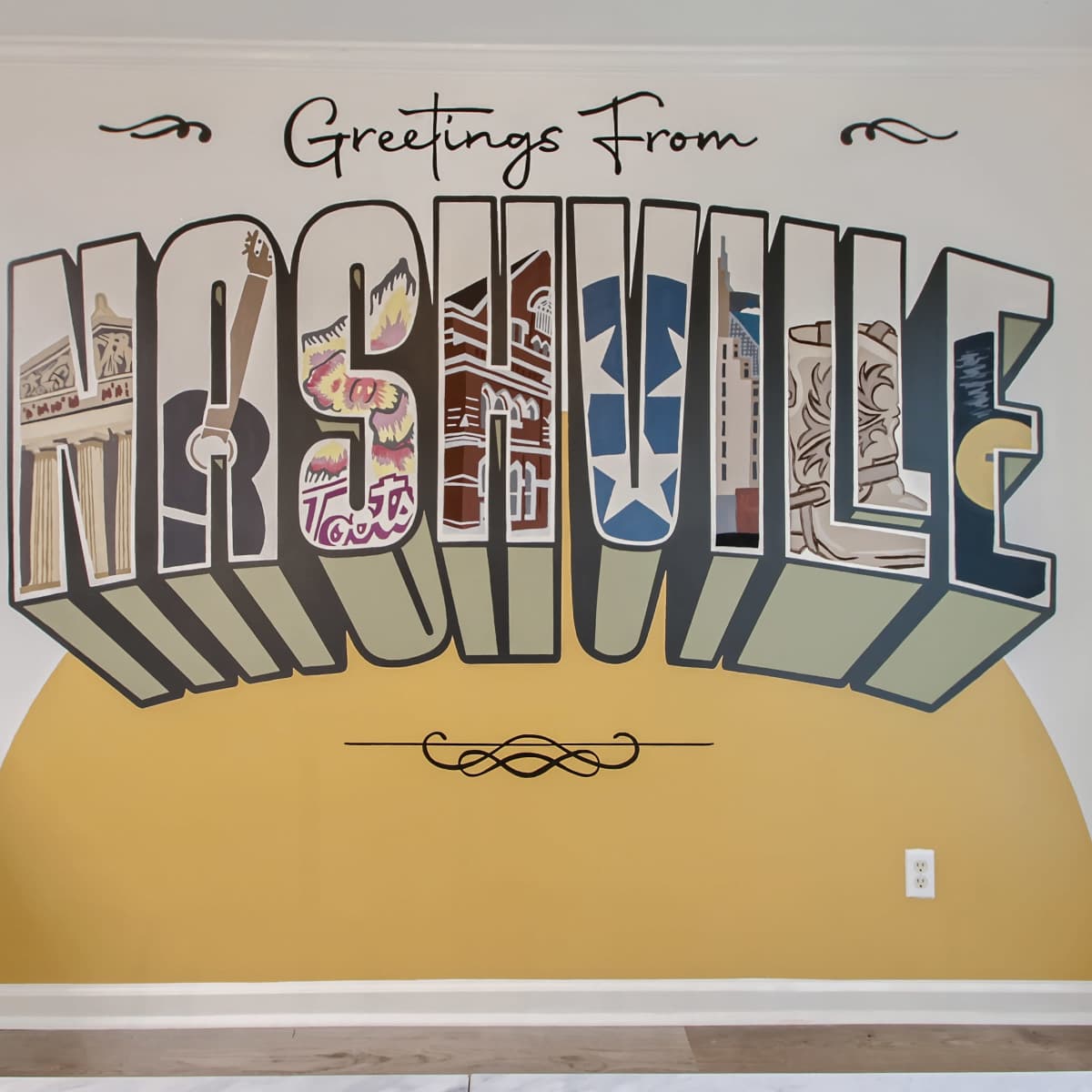 A colorful mural on a wall that reads "Greetings From Nashville" in large, stylized letters.