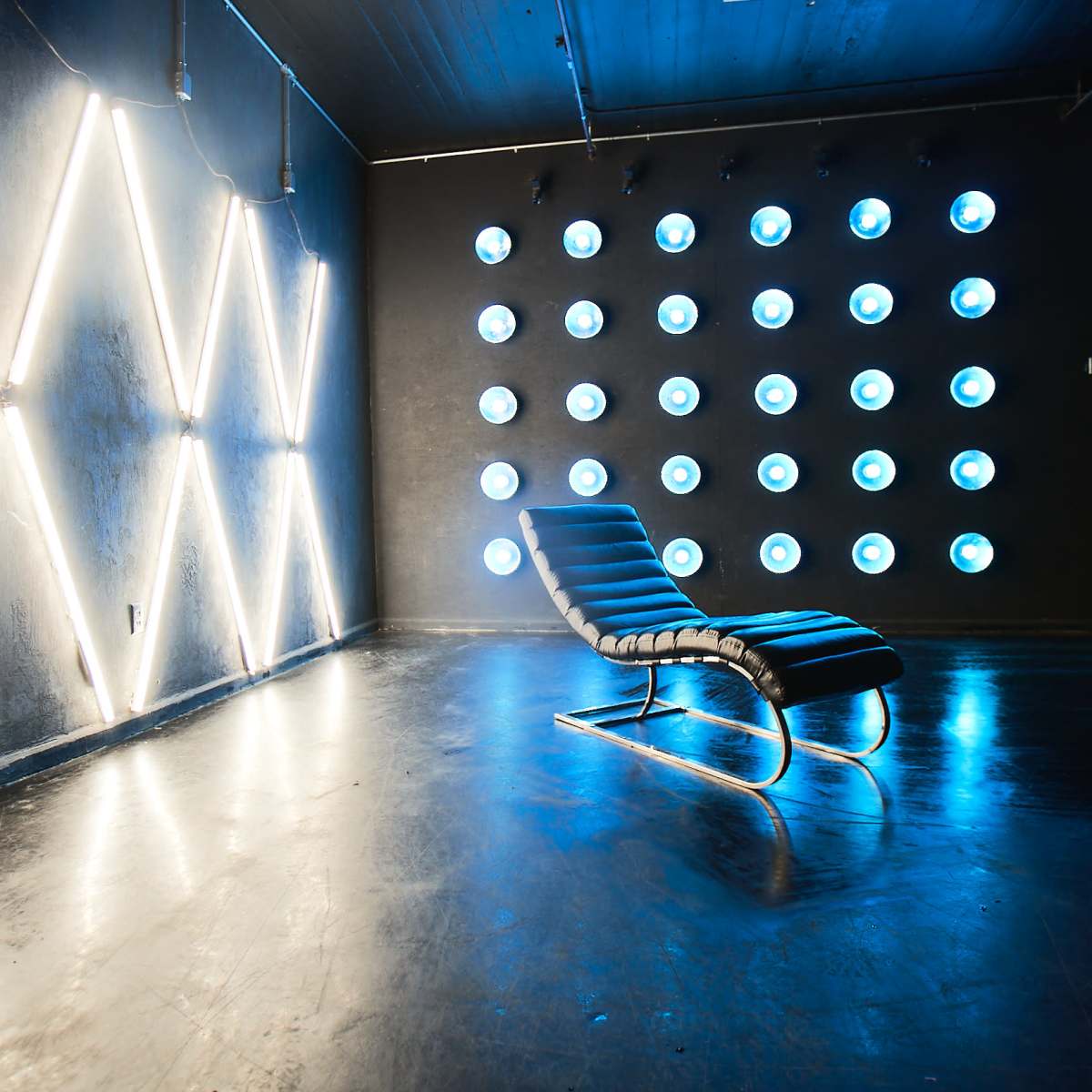 Blackout studio with RGB Astera LED light wall Large X lights and black French wall. Ideal for music dance videos Studio 4 long island city NY Production Peerspace