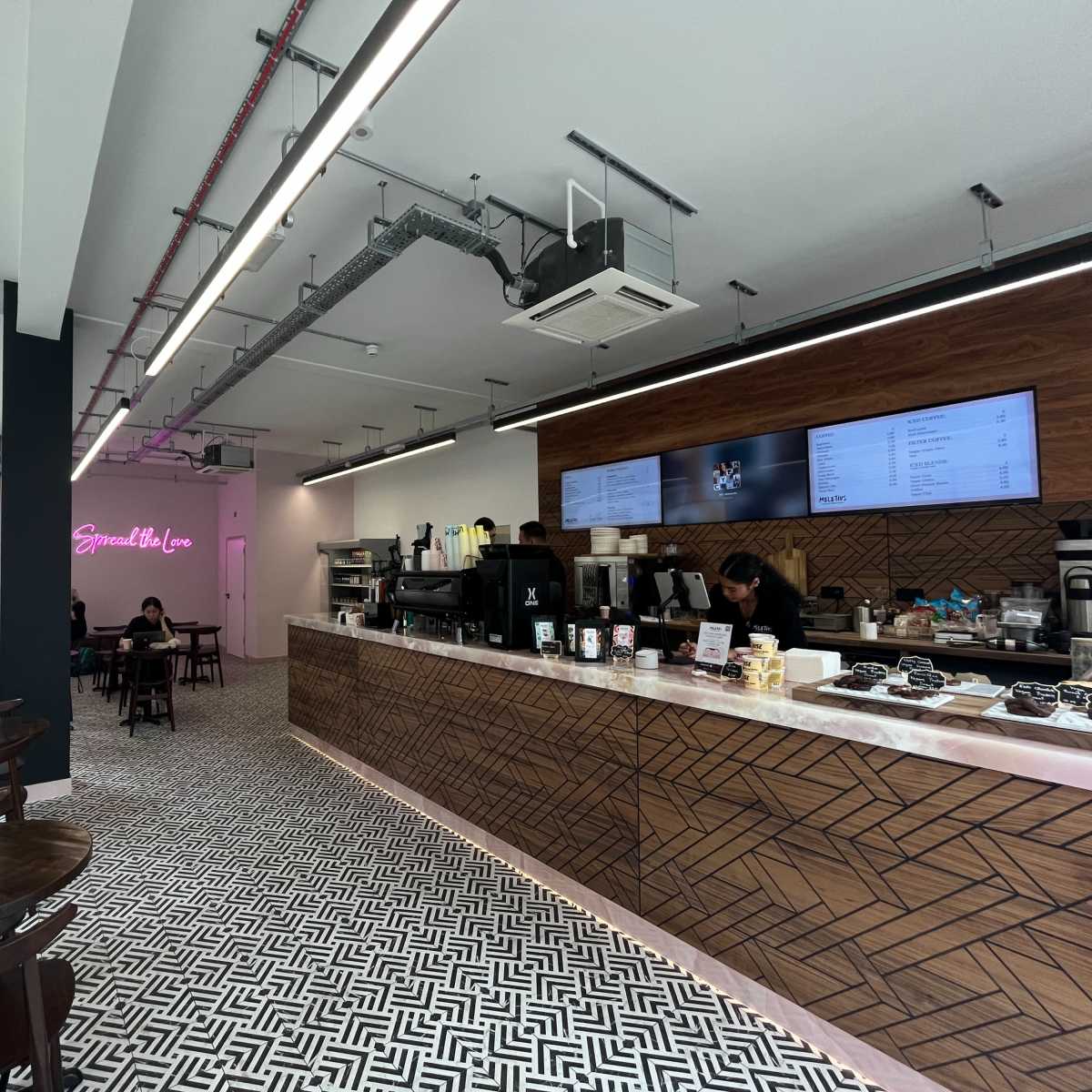 Sunny High Holborn Cafe with Chic Pink Accents in London Image in Holborn, London, ENG