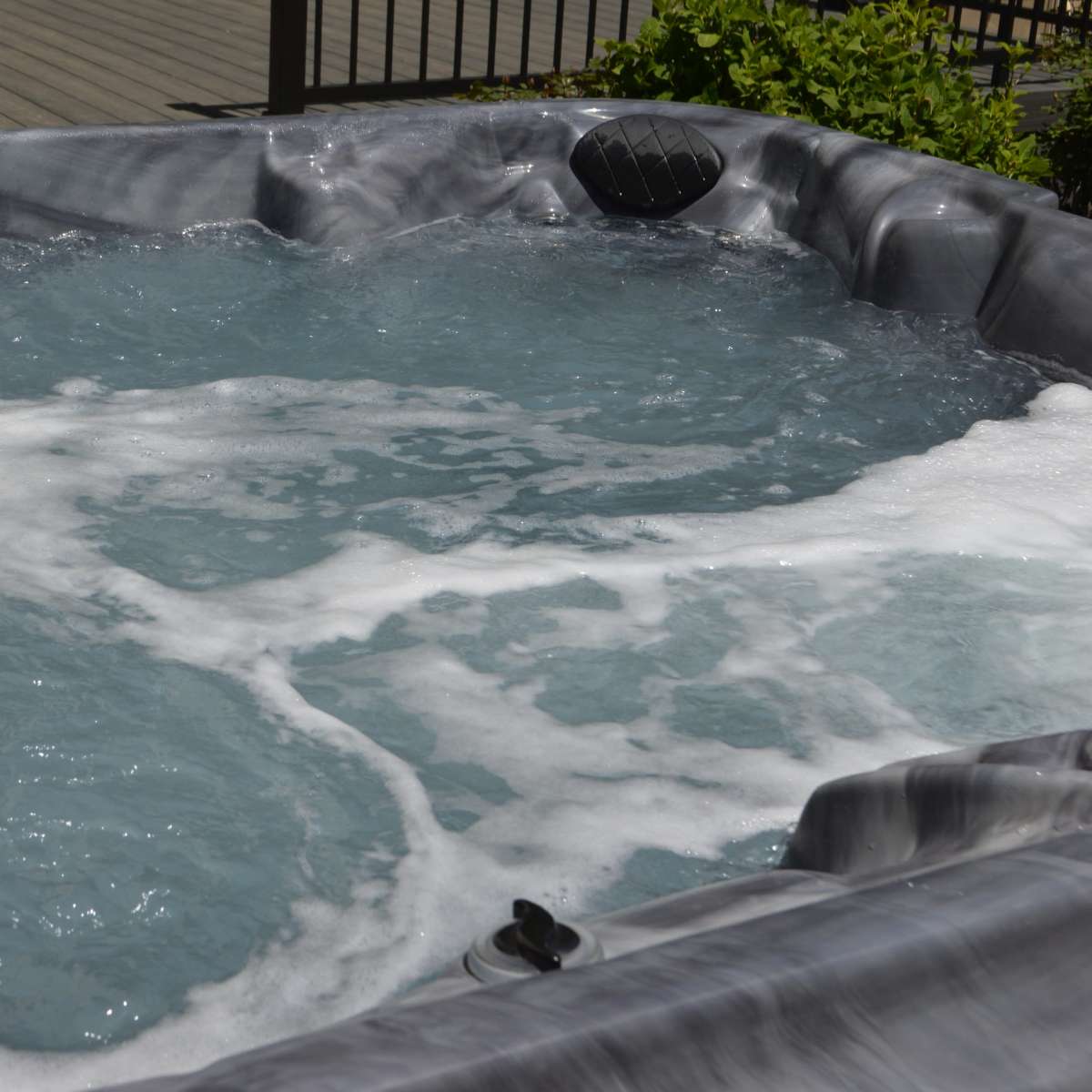 A hot tub filled with bubbling water.
