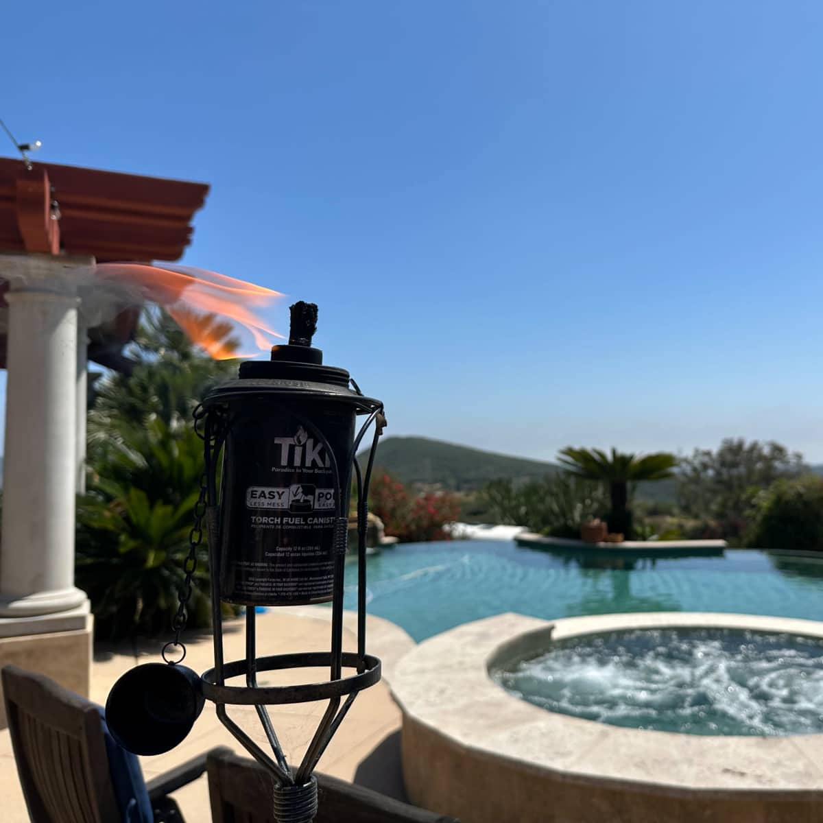 Hilltop Outdoor Pool Lounge with Distant Ocean View in San Marcos Image in , San Marcos, CA