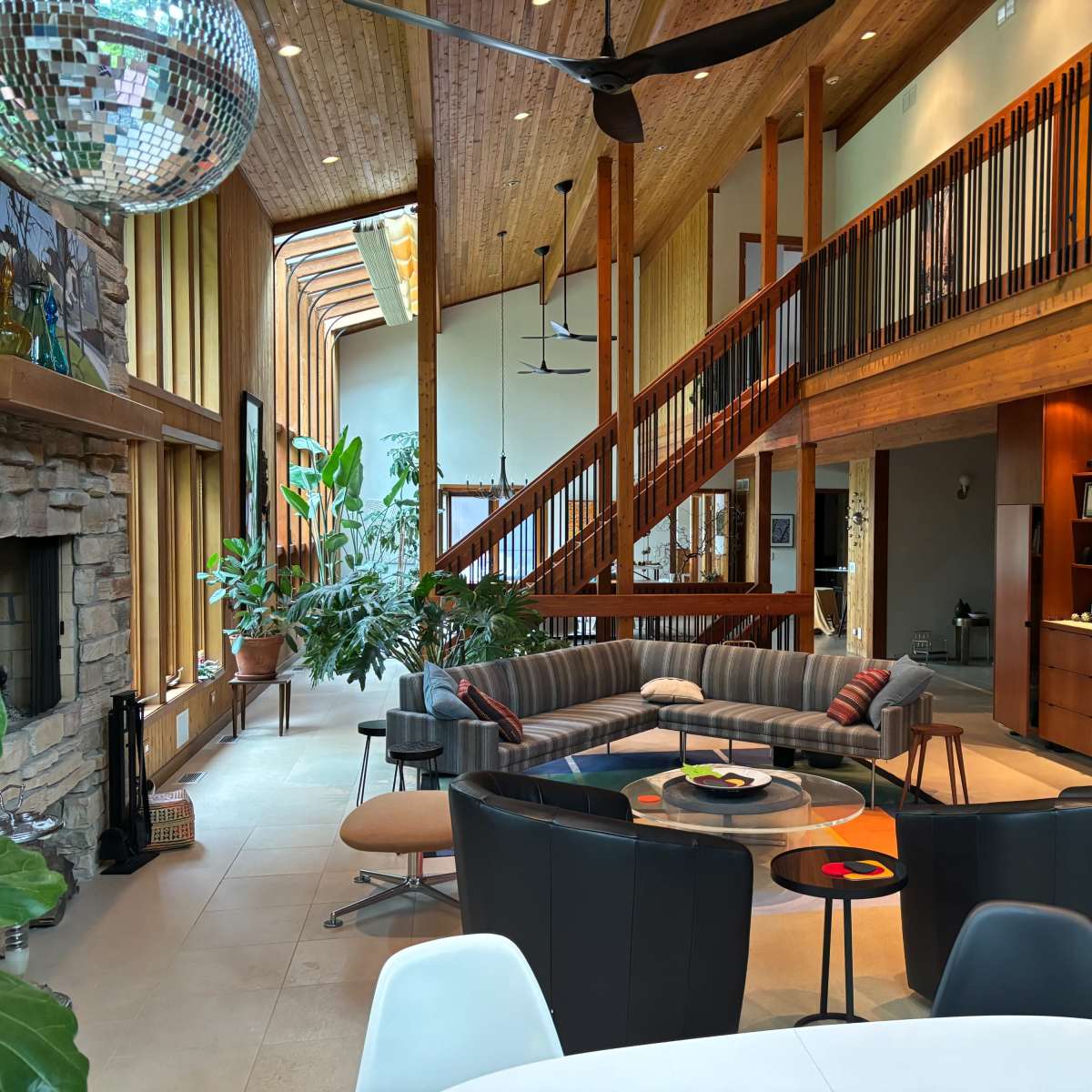 Suburban home in garden setting with lofty, bright and woodsy interior ...