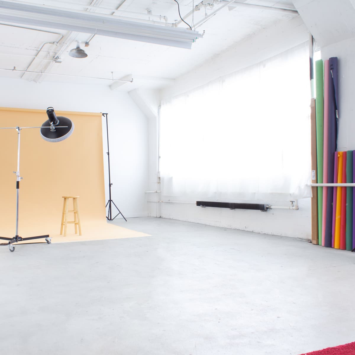 Best Downtown Natural Light Photo Studio White Walls With Industrial Floors in Pontiac