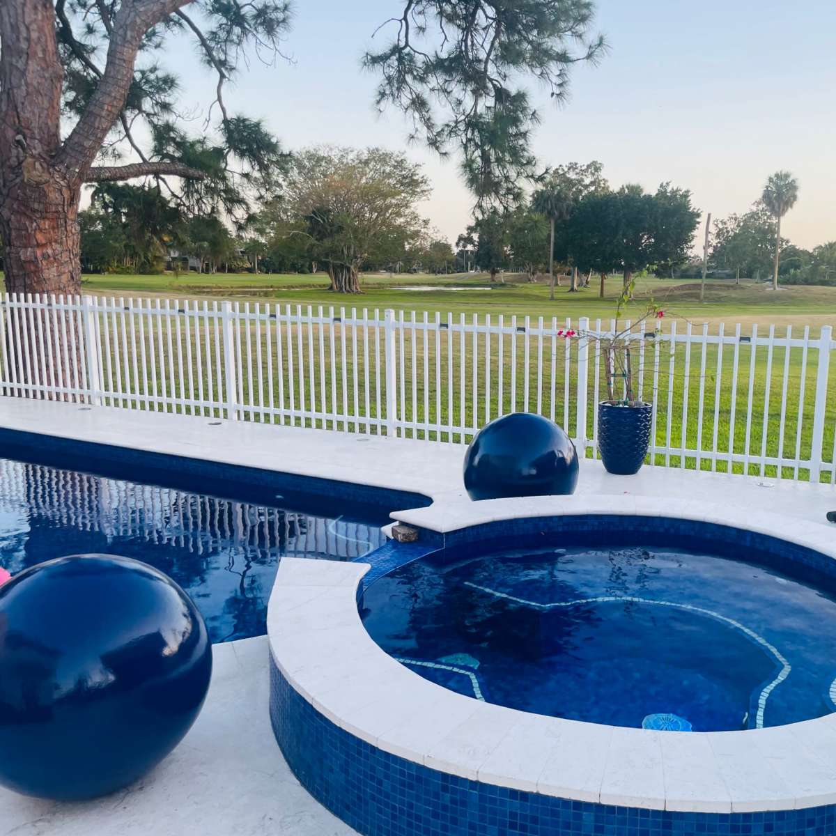 Country club, suburban, outdoor area with pool. Golf course view, roomy area with plenty of seating. in Miami Image in Country Club, Miami, FL