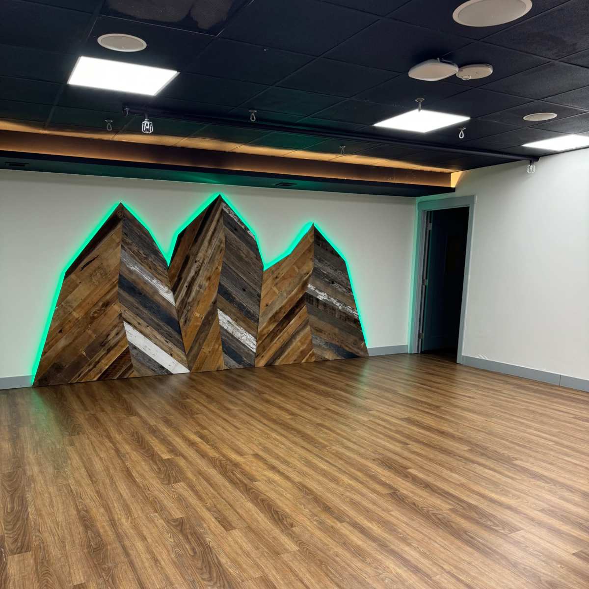 Cozy yoga studio with rustic mountain mural in Aurora Image in Aurora, Aurora, CO