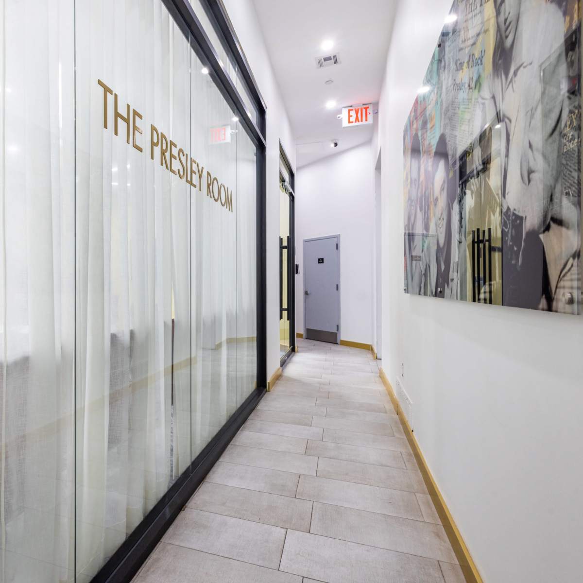 A narrow hallway features a frosted glass door marked "THE PRESLEY ROOM" and is lined with light-colored walls and tiles.