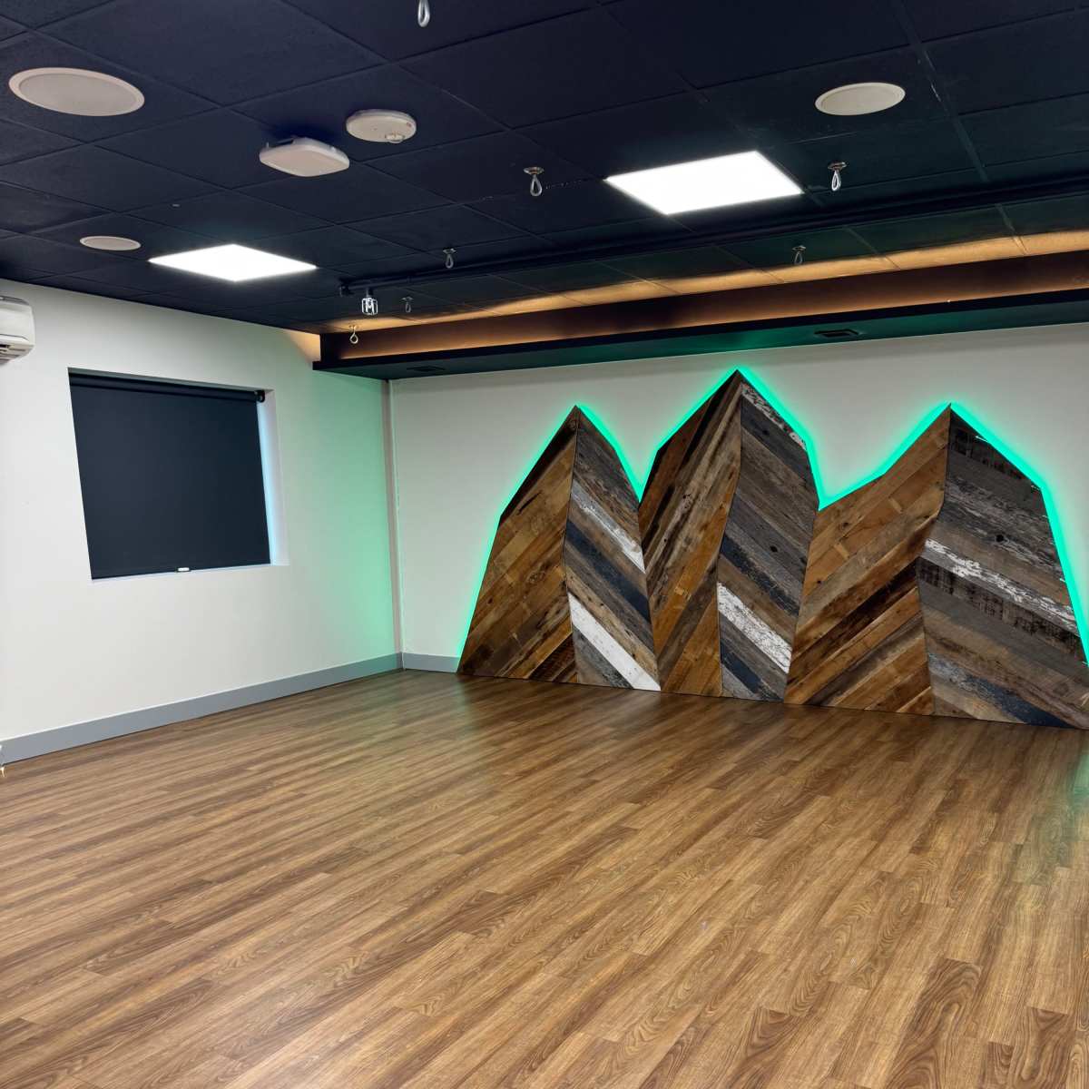 Cozy yoga studio with rustic mountain mural in Aurora Image in Aurora, Aurora, CO