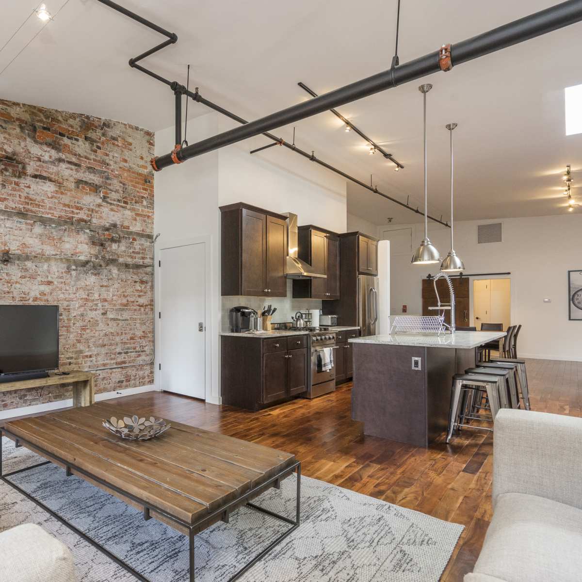 Designer Loft with Exposed Brick in City Center in Philadelphia Image in Center City East, Philadelphia, PA
