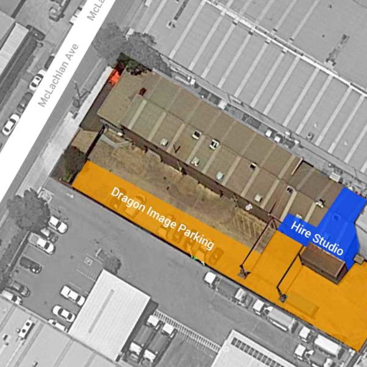 A satellite view of a property with labeled sections for "Dragon Image Parking" and "Hire Studio," alongside nearby streets.