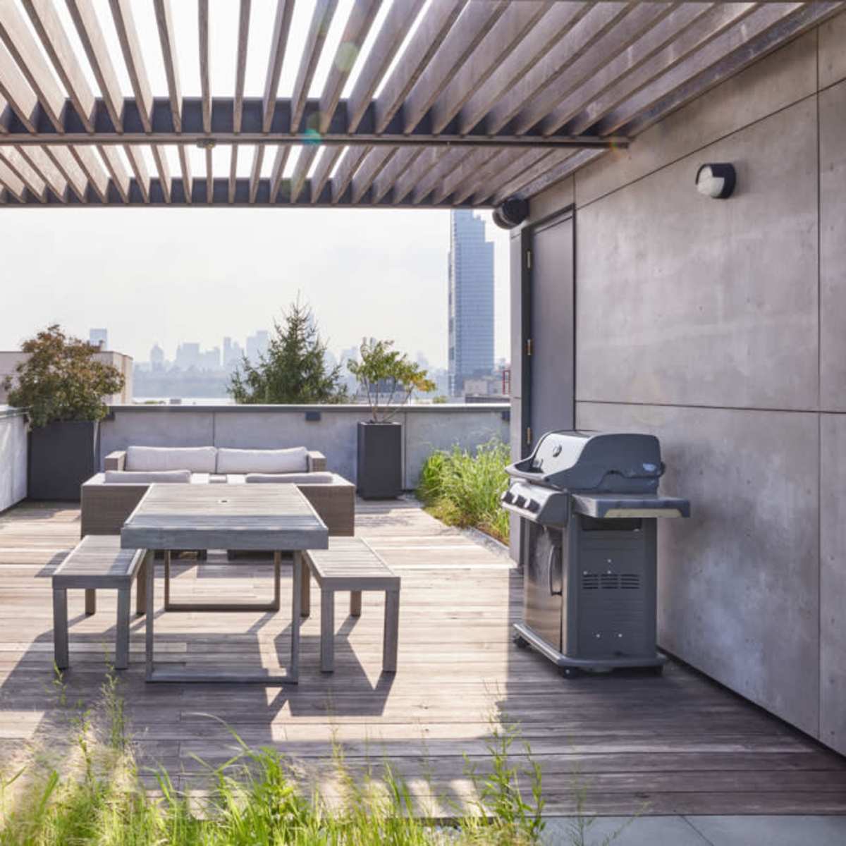 Rooftop with Skyline views annexed to minimal penthouse duplex ...