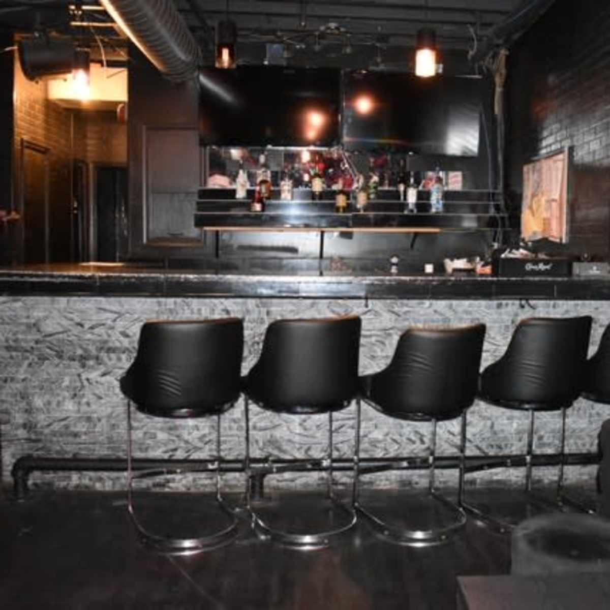 DC themed inspired two level lounge event venue with full bar on each ...