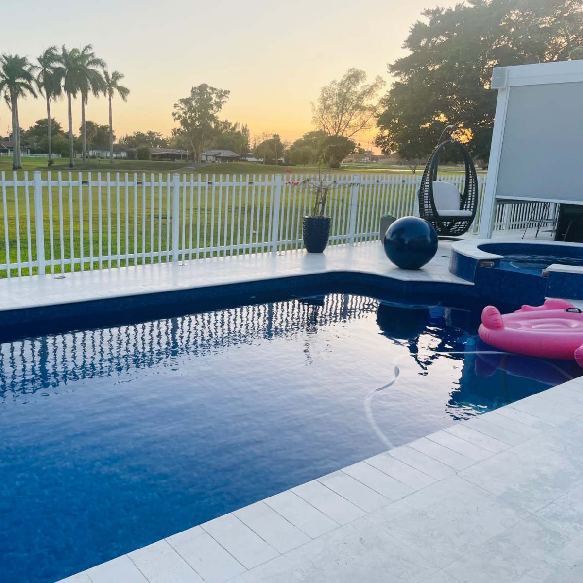 Country club, suburban, outdoor area with pool. Golf course view, roomy area with plenty of seating. in Miami Image in Country Club, Miami, FL