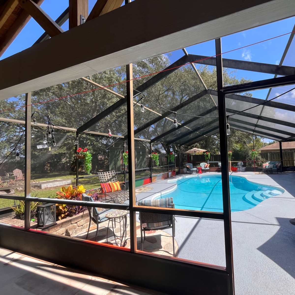 Home with large covered pavilion, huge yard and sparkling pool