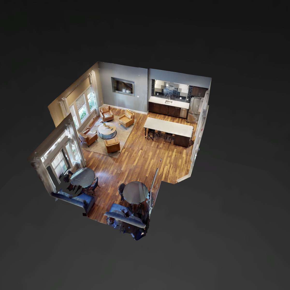 A three-dimensional rendering of a small open-concept living space featuring a dining area, kitchen, and various seating arrangements.