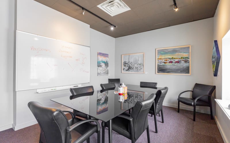 1012 Person Conference Room w/ TV + Whiteboard (Brooklyn/Riverside