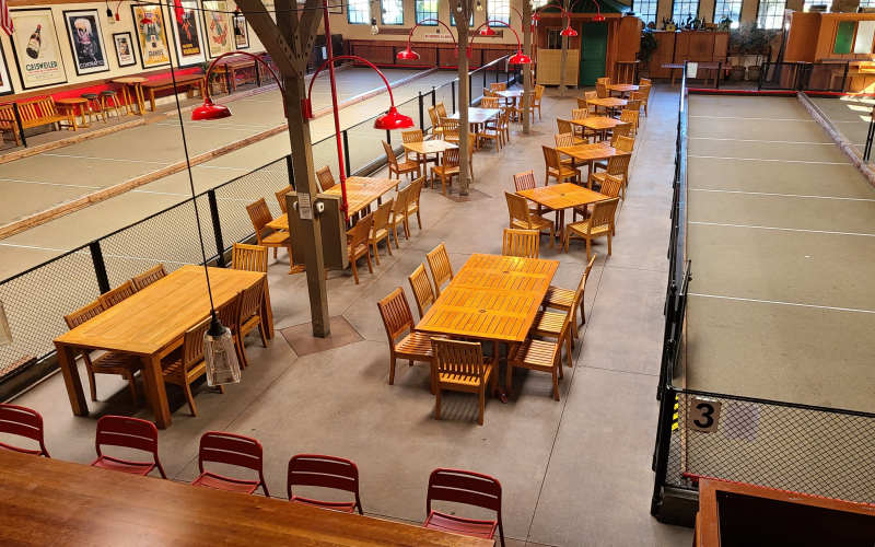 Industrial warehouse with Italian motif restaurant, bar, and bocce ball