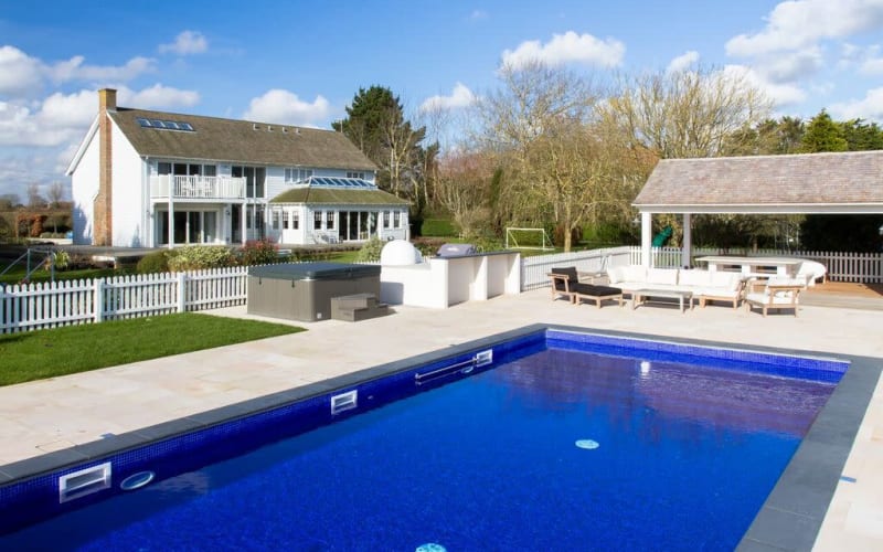 New England style house with deck and pool, Chichester Production