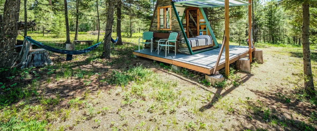 Tiny A-Frame Cabin on 100 Forested Acres in Bonner Hero Image in undefined, Bonner, MT