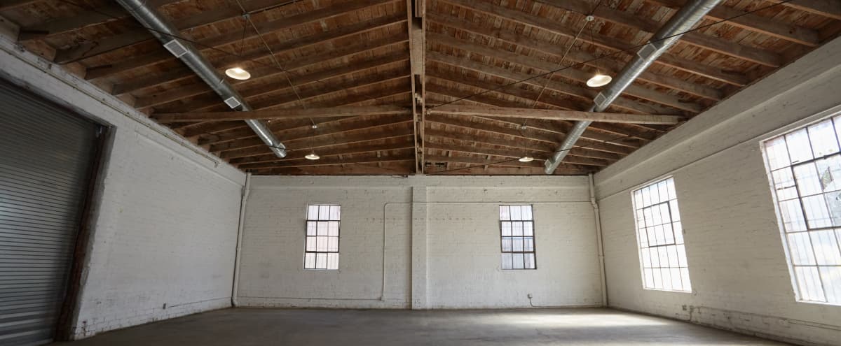 Downtown Brick Warehouse with Bowed Wooden Beams in Los Angeles Hero Image in Historic South Central, Los Angeles, CA
