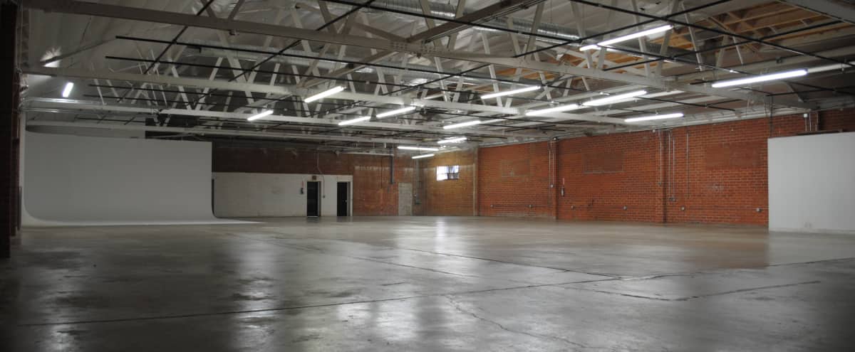 Polished Exposed Brick Warehouse Studio with Large ...