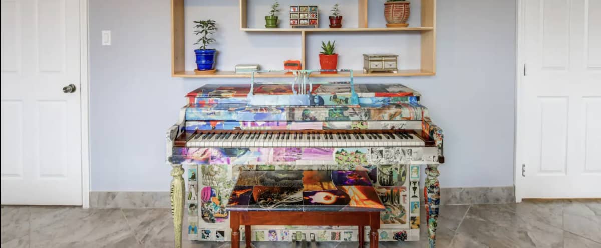 Artsy Apt with Gorgeous One of a Kind Collage Art Piano in East Point Hero Image in East Point, East Point, GA