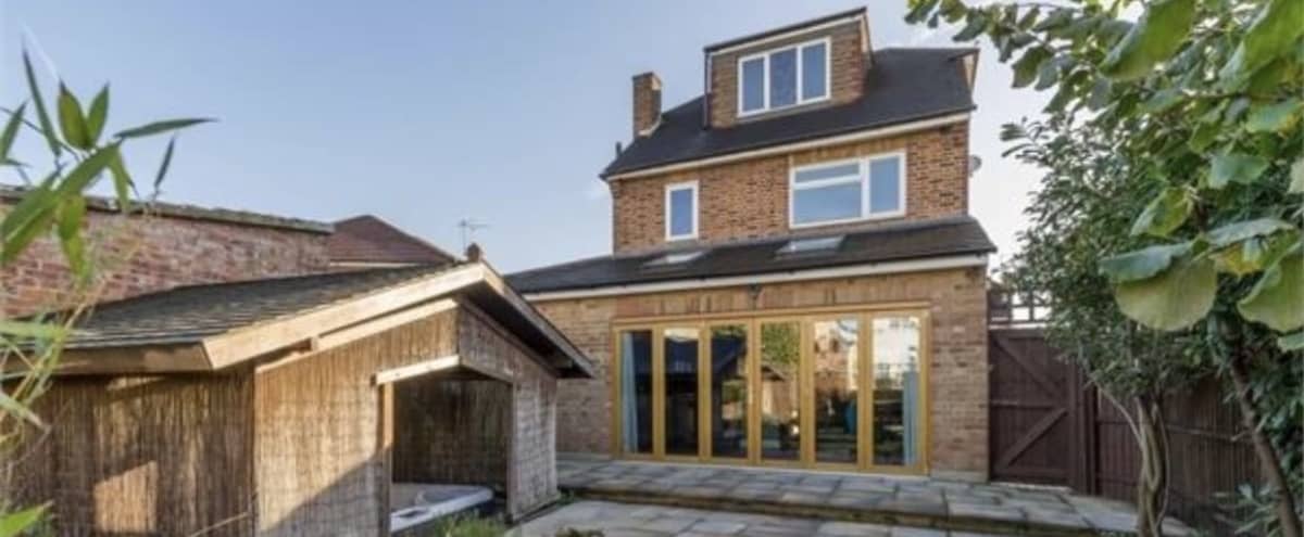 Luxury Detached House with Garden & Hot Tub | Close to Station in LONDON Hero Image in undefined, LONDON, 