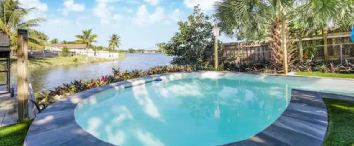 Lake Front Villa | Pool | Kayak | Movie Theatre in Miami Gardens Hero Image in undefined, Miami Gardens, FL