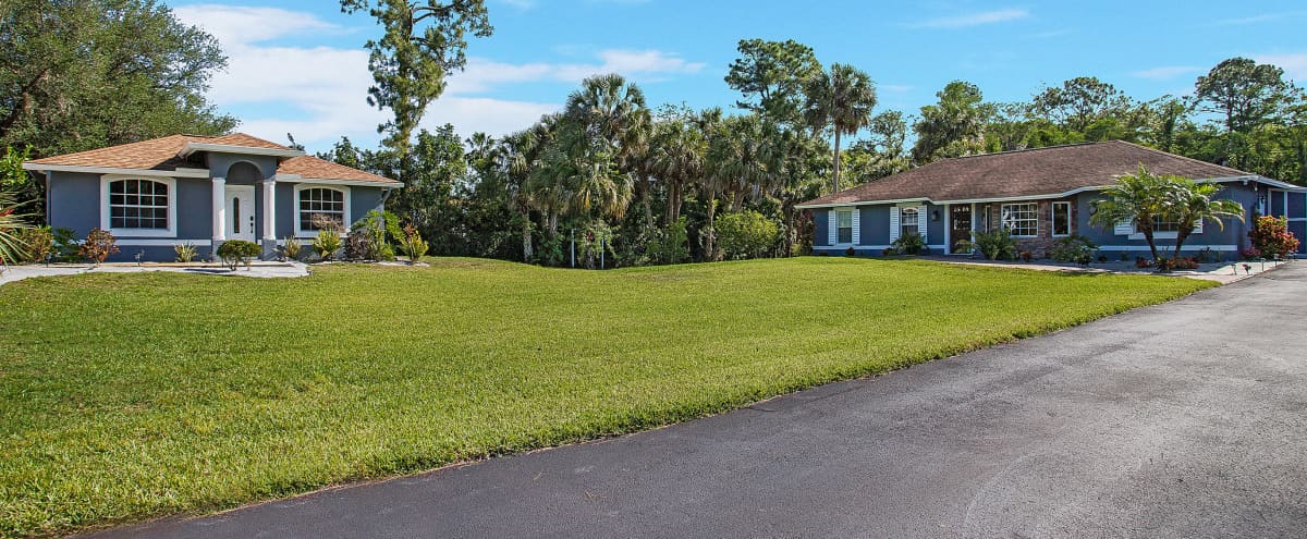 Beautiful and Spacious Gated Home with a Guest House in Naples Hero Image in Rural Estates, Naples, FL