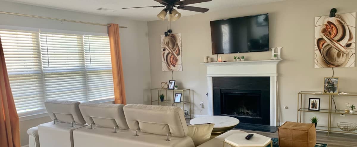 Spacious Modern Home With Cozy Fireplace Home Office Natural Light Hampton Ga Production Peerspace