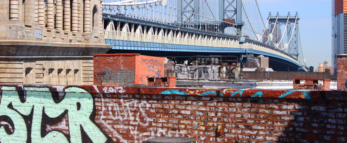 Dumbo Rooftop Brooklyn Street Art With Incredible Views Overlooking Nyc And The Manhattan Brooklyn Bridges Holding Included