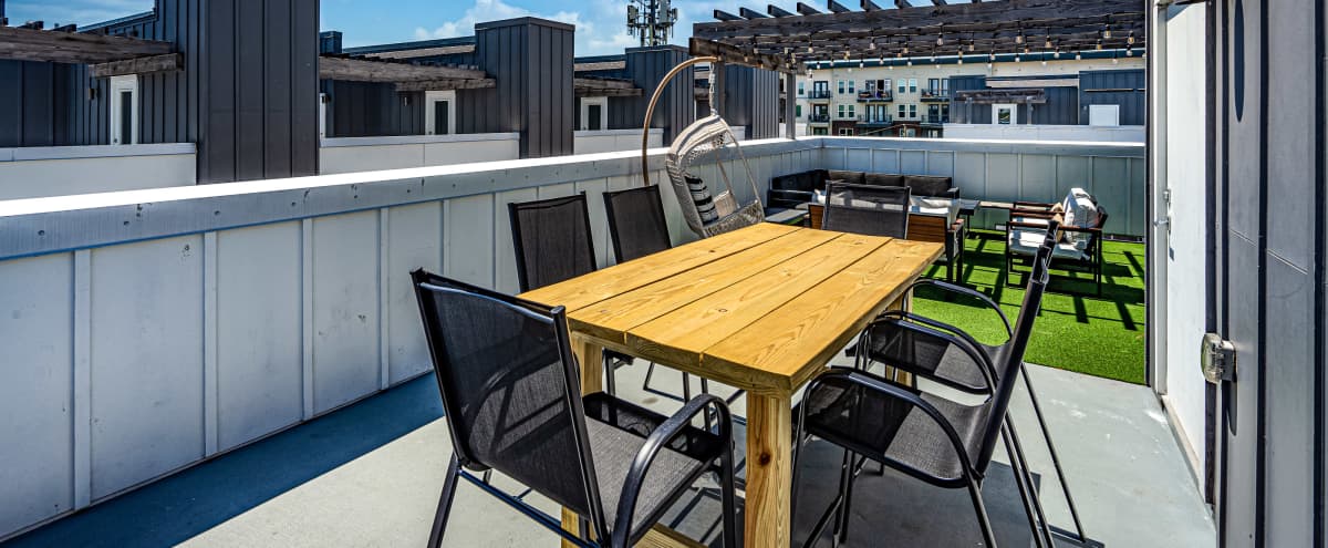Spacious Townhome | Private Rooftop with Skyline Views | Free Parking in Dallas Hero Image in Old East Dallas, Dallas, TX