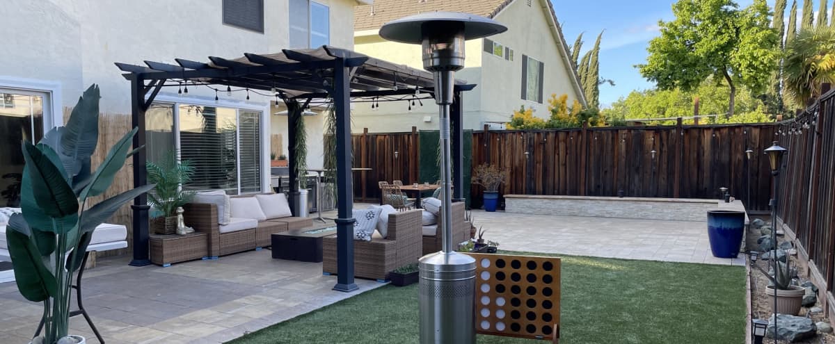 Newly Remodeled Backyard w/ Faux Grass, Firetable, Patio Heaters & Outdoor Kitchen in ANTIOCH Hero Image in Antioch, ANTIOCH, CA