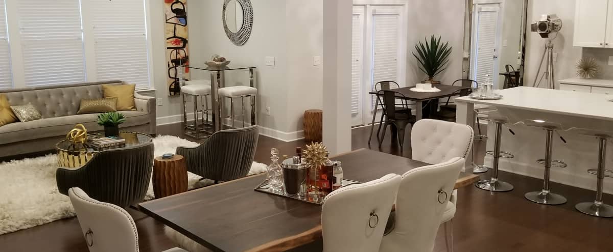 Modern White Kitchen With High End Features Part Of Open Concept