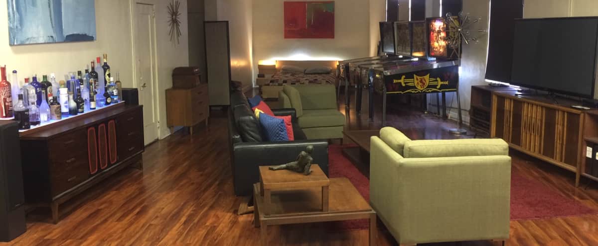 New York Style Mid Century Loft With Pinball Machines Sputnik Lighting And Lots Of Character