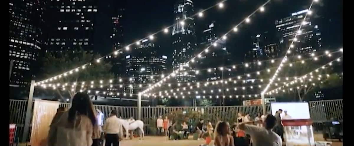 Downtown La Office Space And Outdoor Patio With Bistro Lighting