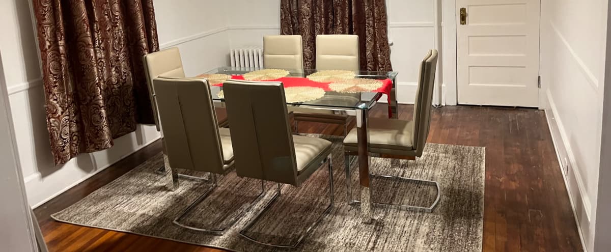 Private Dining Room - with Classic Hardwood Floors and Executive Glass Table in East Orange Hero Image in undefined, East Orange, NJ