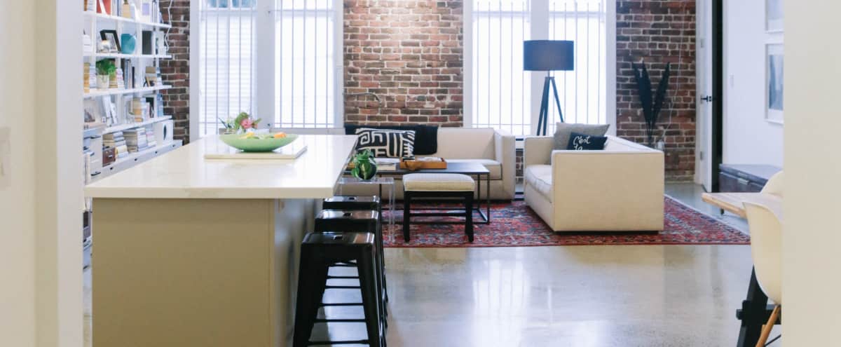Loft With Natural Light Brick Wall Kitchen