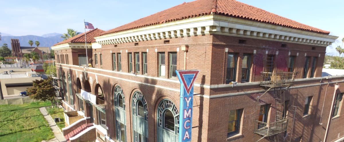 1920 - Historic YMCA Brick Building - Beautiful Old School Gym with Stain Glass Windows in Pomona Hero Image in Pomona, Pomona, CA