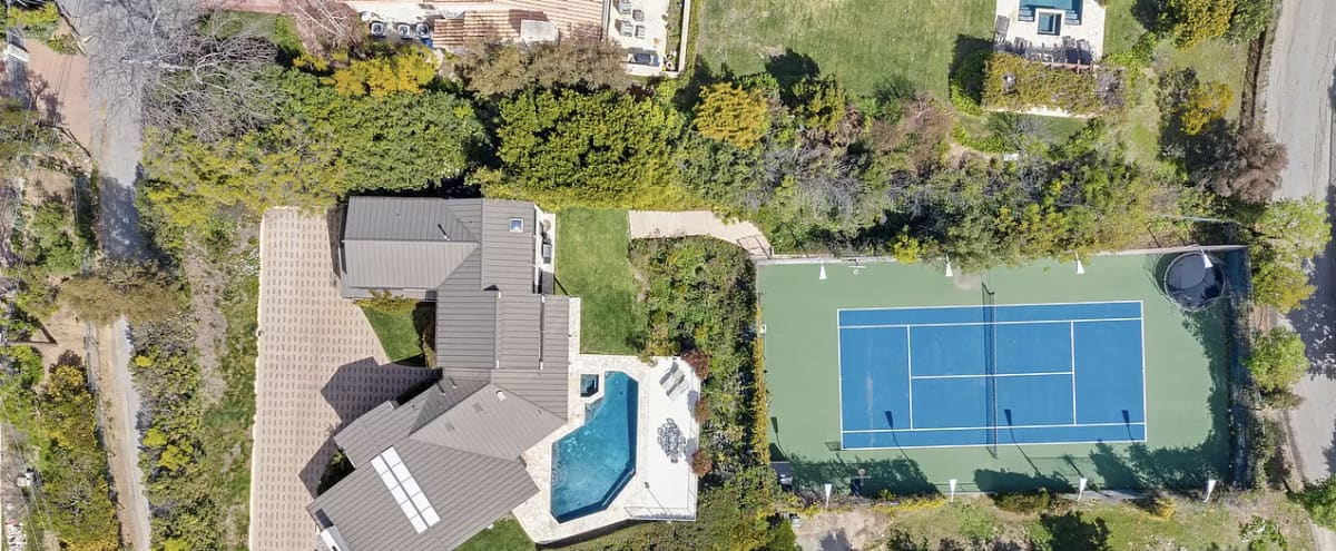Malibu Dream House with Ocean Views + Private Tennis Court in Malibu Hero Image in Eastern Malibu, Malibu, CA