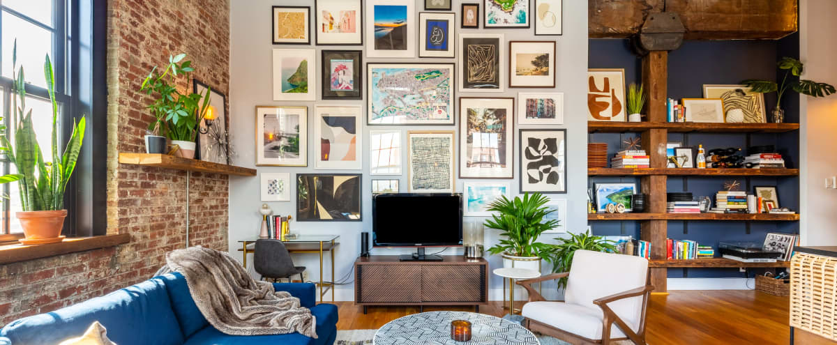 Modern Art-Filled Penthouse Loft with 14-ft Ceilings & Rooftop in Williamsburg (ft. on Apartment Therapy) in Brooklyn Hero Image in Williamsburg, Brooklyn, NY