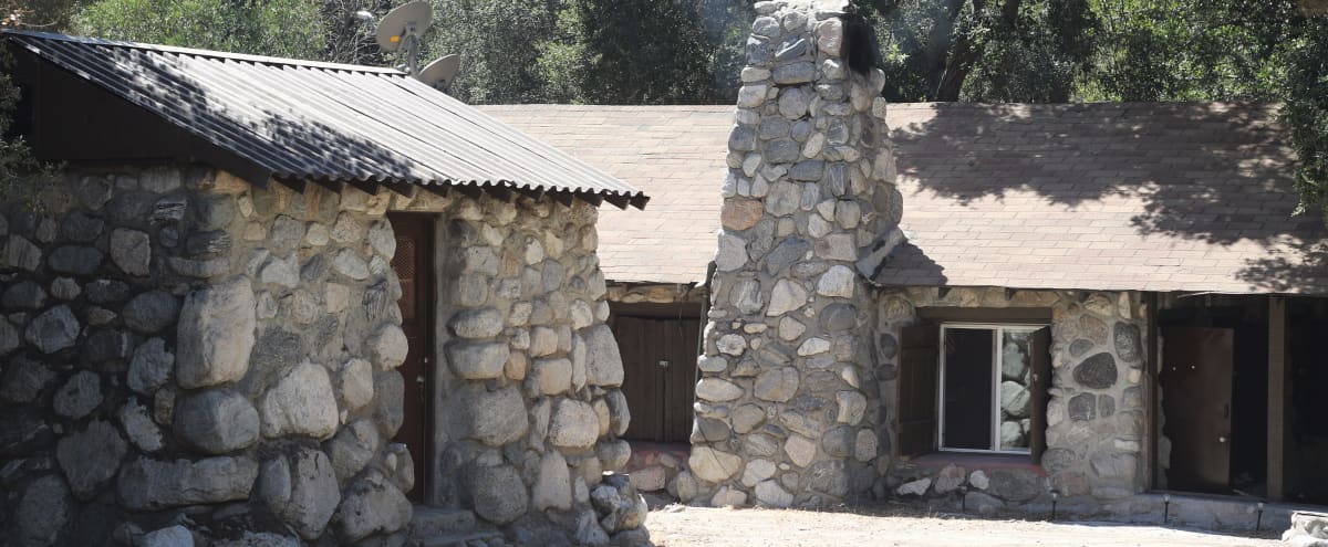 Rustic Stone Cabin Next To River Under Magnificent Oak Trees 11