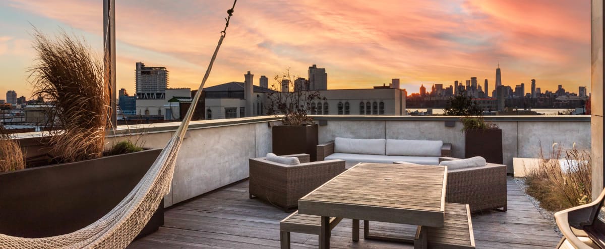 Rooftop with Skyline views annexed to minimal penthouse duplex in Brooklyn Hero Image in Greenpoint, Brooklyn, NY